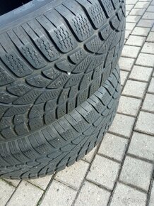 opony 235/65/17 r Dunlop winter sport 3 d 104 h bieżnik ok 7 - 5